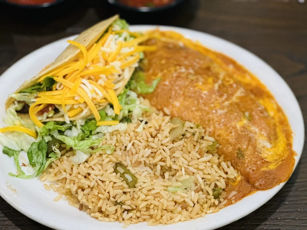 Taco plate with rice and a cheese enchilada at Don José